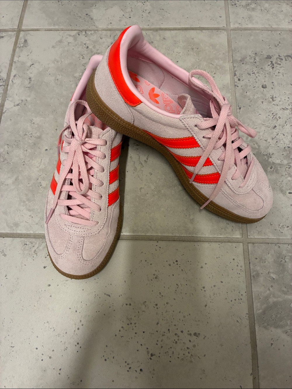 adidas handball spezial sneaker in clear pink/solar orange